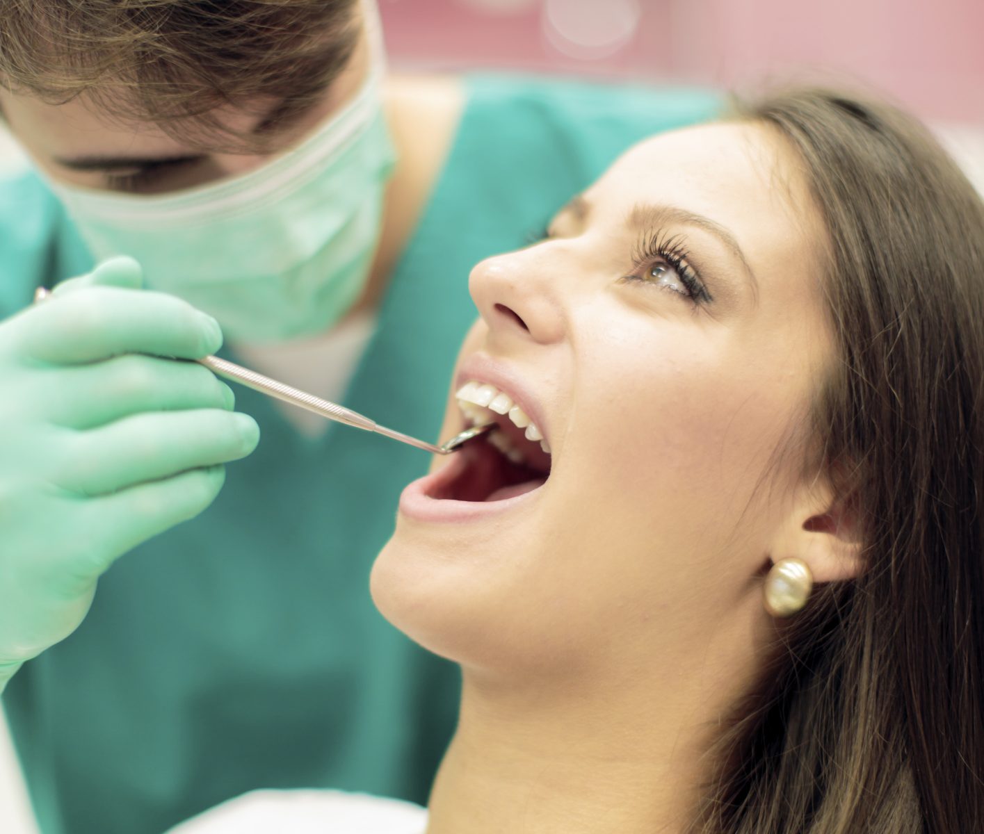 woman having teeth looked at