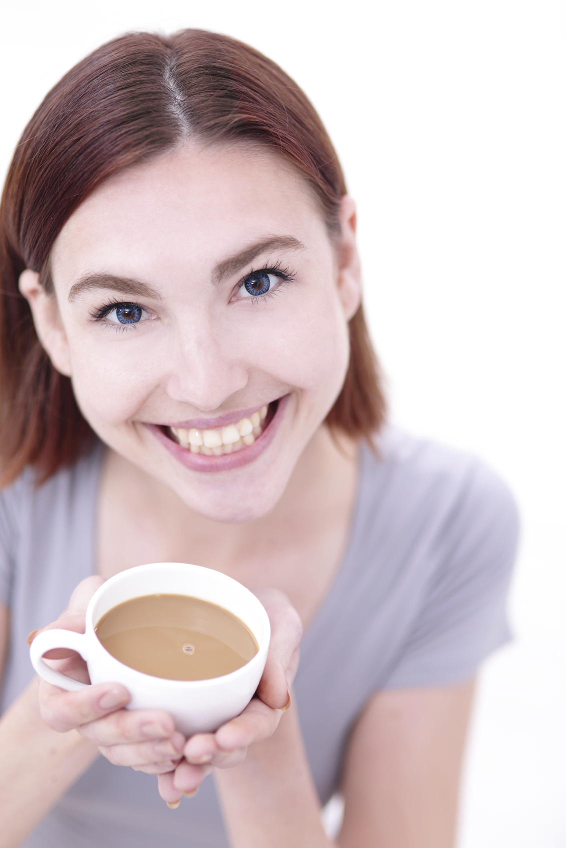 woman drinking coffee can cause tooth discoloration